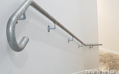 Stairway Location and Handrail Extensions at an Internal Corridor