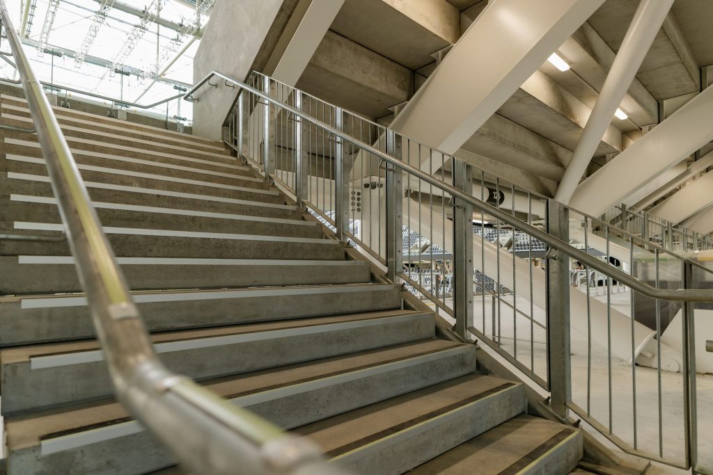 Moddex handrail and balustrade system along stadium stairs at One New Zealand Stadium Te Kaha